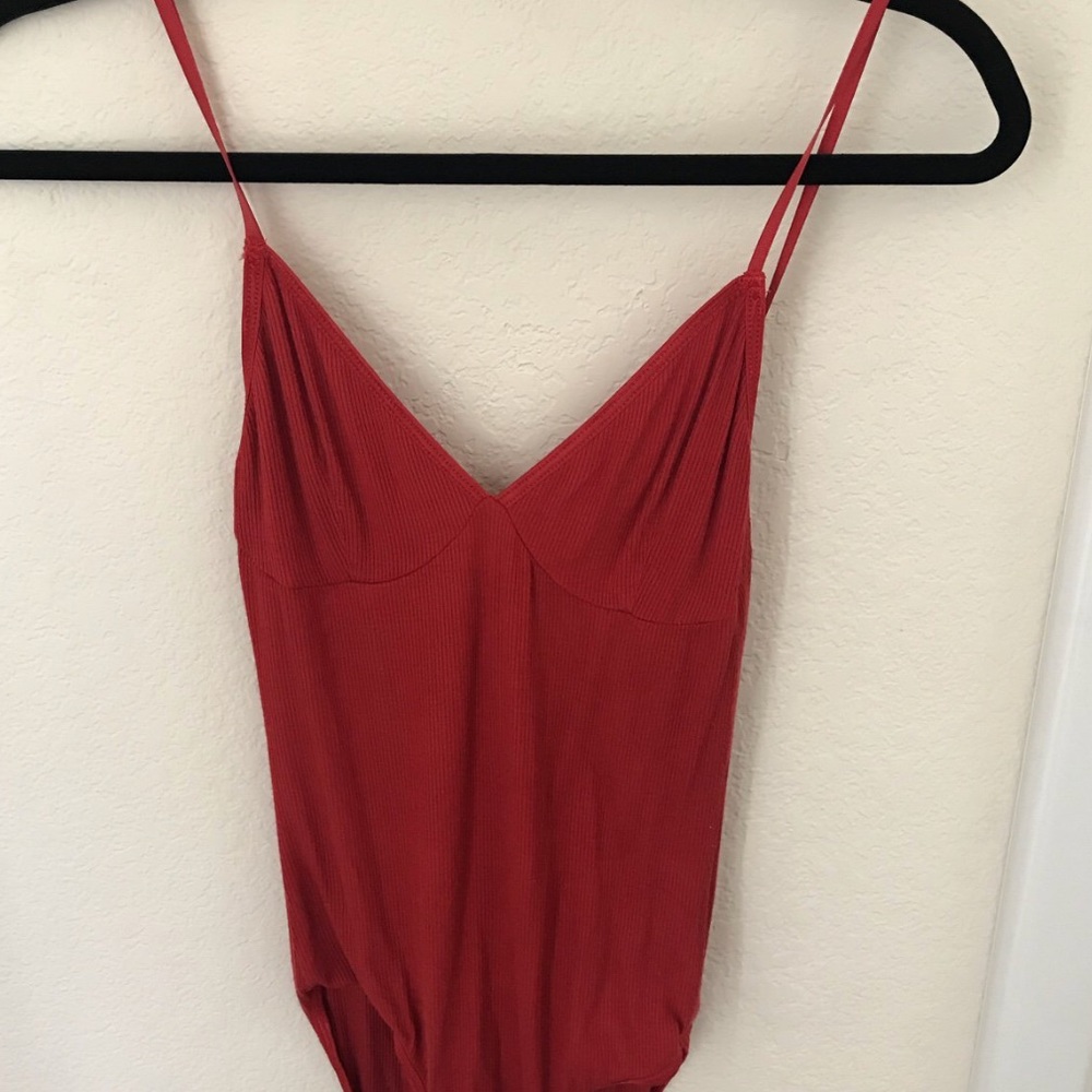 Sofia bodysuit in chili red.